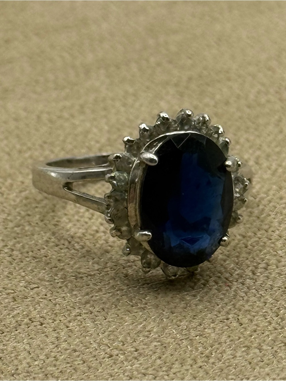 Avon size 11 Classic Silver Ring with Deep Blue Oval Stone and Halo